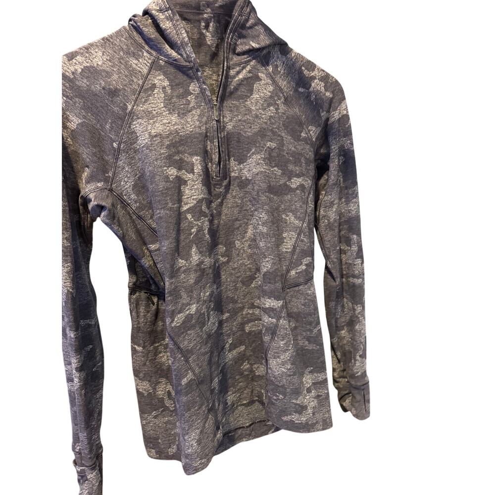 Lululemon Warm Stabilizer 1/2 Zip Hoodie featuring a dark heathered camo pattern